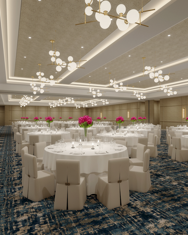 The image shows an elegant banquet hall with round tables, white chairs, chandeliers, and floral centerpieces.